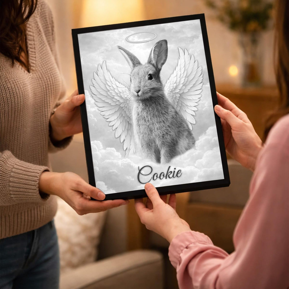 Portrait ailé en noir et blanc offert de main en main en cadre noir, un cadeau de soutien après la perte d'un animal, avec son prénom, livré chez vous (exemple)