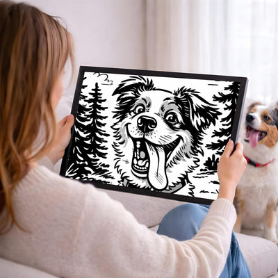 Votre photo devient un portrait caricature noir et blanc en format paysage, ici en cadre noir tenu en main ; cadre noir, blanc, bois clair ou bois foncé au choix, livré chez vous (exemple)