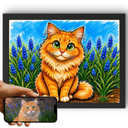 Création personnalisée : la photo de votre chat devient un portrait caricature couleur en format paysage, façon caricaturiste de rue, aspect feutre, imprimé en cadre noir et livré chez vous (exemple)