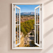 Trompe-l'œil sur Aix-en-Provence : les platanes, les toits ocre et la montagne Sainte-Victoire, par une fenêtre blanche ouverte, sur toile canvas tendue ou plexiglas, livré chez vous (exemple)