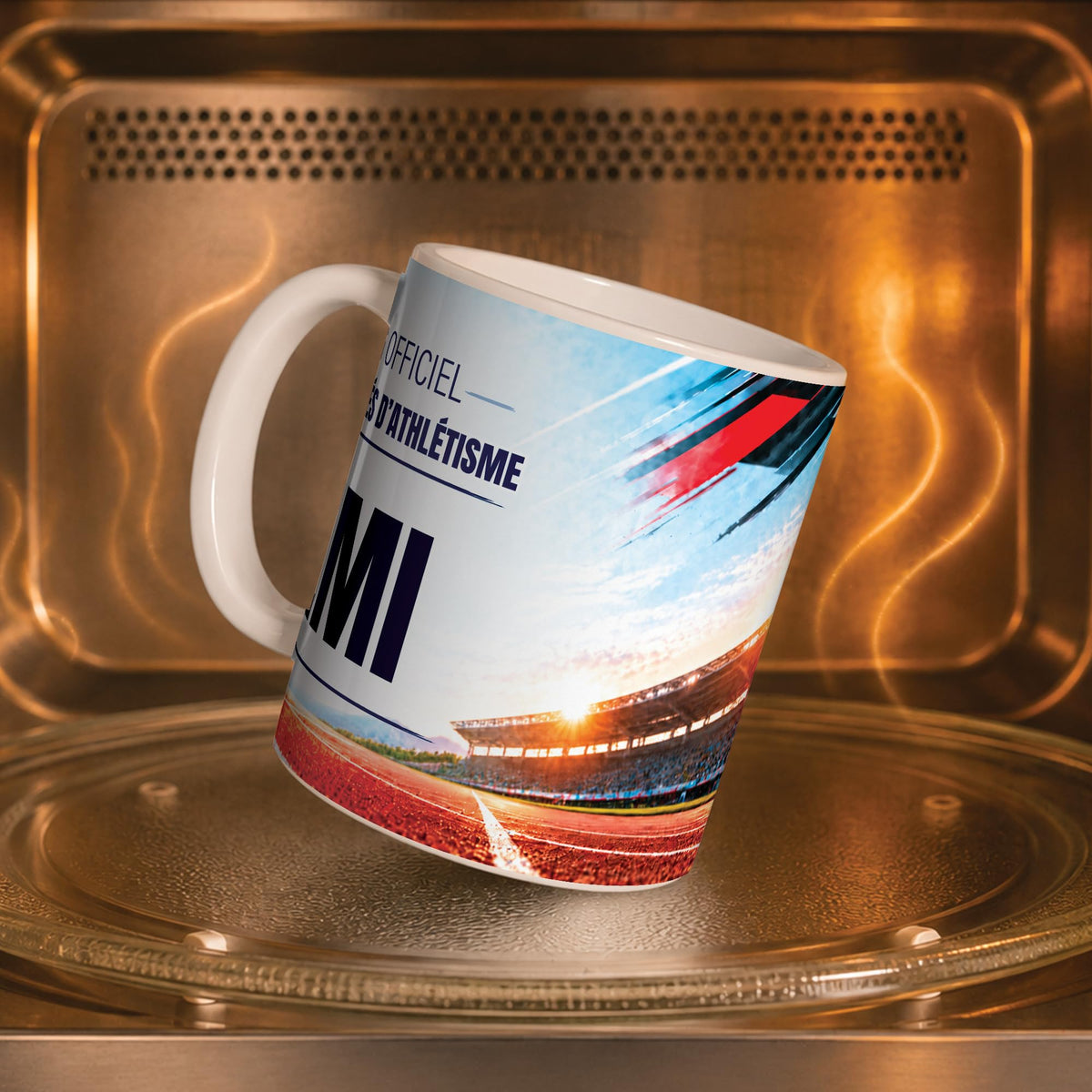 Mug athlétisme dans un four à micro-ondes, on y voit la piste rouge et le stade : compatible micro-ondes, aussi en version magique révélée par la chaleur ; livré chez vous (exemple)